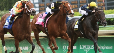 Dame Dorothy and La Verdad Face in Bed o' Roses